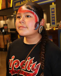 At the Trail Blazers' Native American Heritage Night, the Moda Center  highlighted Indigenous culture and heritage with performances, traditional  regalia, Native artists, and community vendors. Guided by insights from  CRITFC's Anna Allen,