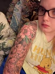 Who are some good tattoo artists for black and gray line work in Lakeland?