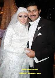 صور الفنانين المصريين وزوجاتهم صور زوجات الممثلين المصريين Fashion Nun Dress Movie Stars