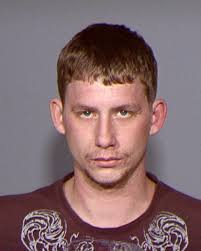 Hopkins Man Charged with Burglary, Domestic Assault