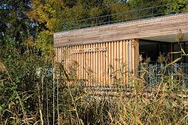 L Ecole Elementaire Simone Veil A Magny Le Hongre Construction En Ossature Et Bardage Bois Est Un Modele De Performa Magny Le Hongre Bardage Bois Construction