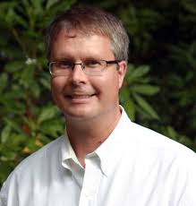 Dr. Christopher E. Parrish