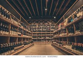 At The Supermarket Rows Of Wine Waiting For Customers Wine Store Design Interior Photography Background For Photography