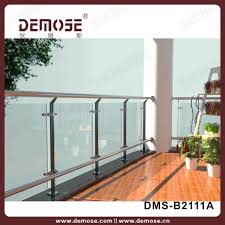Plain 3/8x2 flat bar top and bottom rails, 1/2x1/2 solid pickets, and 2x2x14ga square tubing posts. Tempered Glass Balcony Railing Price Glass Deck Railing Glass Railing Fittingsglass Railing Parts Aliexpress