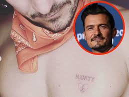 Dog tattoo designs & their meaning. Celebrities With Tattoos Of Their Pets