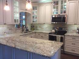 At present, china has become one of the most productive you will find plentiful labor resources from the pearl river delta base. Forevermark Signature Pearl Cabinets Yellow River Granite And Travertine Backsplash Wall Interior Design Kitchen Kitchen Design Kitchen Cabinet Design