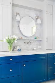 Add a new elegance to your bathroom with a gorgeous new granite vanity top. Master Bathroom Vanity With Blue Cabinets Hgtv