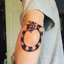 It violently writhes on the forest floor, recalling a snake in a bad horror movie. Beetlejuice Saturn Sand Worm Tattoo Beetlejuice Tattoo Saturn Tattoo Tattoos