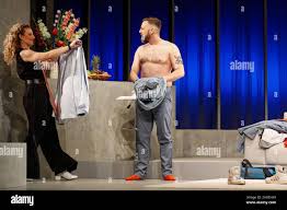 Berlin, Germany. 05th Jan, 2022. Alessija Lause and citizen Lars Dietrich  stand on stage during the photo rehearsal of the play 