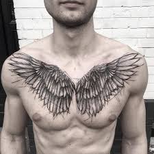 Amazing angel wings tattoos on chest. 60 Awesome Angel Wings Tattoo Designs To Try Artistic Haven