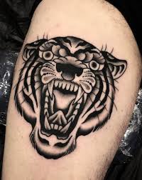 Full leg black torch traditional tattoo. 60 American Traditional Tiger Tattoo Ideas