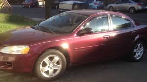 Image result for Dark Garnet Red 2002 Stratus