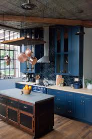 In Love With This Dark Kitchen With Blue Cabinets Copper Accessories Taylor Taylor Farmhouse Kitchen Decor Kitchen Design Decor Farmhouse Interior Design