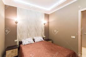 A look at a double bed in a room setting. Hotel Room Small Bedroom With Double Bed Modern Interior Room Stock Photo Picture And Royalty Free Image Image 41070398