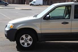 Image result for Gold Ash 2005 Escape