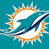 A teal dolphin and an orange circle representing the sun. 1