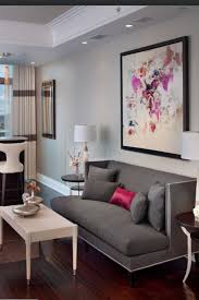Love The Grey With A Pop Of Raspberry The Wall Color Is Nice Too Minimalist Living Room Minimalist Living Room Design Stylish Apartment Decor
