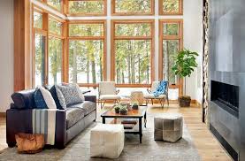 The color scheme is very simple with large windows bringing the outdoors in. Before After Modern Rustic Living Room Design Online Decorilla