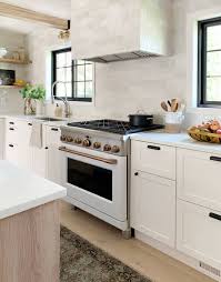 This Stunning Kitchen Makeover By Chris Loves Julia Features An Ingenious Ikea Hack Hunker Home Decor Kitchen Budget Kitchen Makeover Modern Kitchen Design