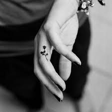 This is a great simple and small tattoo option for those not wanting any color and wanting something small enough to be easy to hide. Small Rose Tattoos 30 Beautiful Tiny Rose Tattoo Ideas