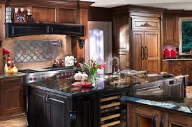 A navy island paired with white cabinetry and brass hardware is sure to create a timeless kitchen with tons of class. Portfolio Dewils Design Center
