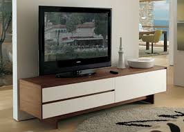 De inzetmogelijkheden van de highboard zijn dankzij de vleugeldeuren en de dekselopening veelzijdig: Modern Tv Stand Furniture Furniture Design King Furniture