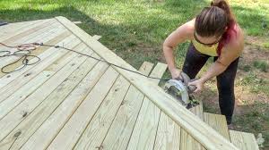 If you extend the deck on one side, you create a place choose lumber size according to the spans you have and the size of your pool and deck. Diy Floating Deck Part 4 Trimming Deck Boards And Rounding The Edges Ugly Duckling House