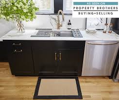 Black kitchen cabinets complement most countertop colors. Black Kitchen Cabinets Diamond Cabinetry