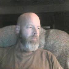 How to find photos or stories about Judge William Bruce Lykins in Kentucky?