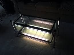 Bend the lighting down and add a the same 5m strand of lights around the bottom of the tank. Aquarium Coffee Table 7 Steps With Pictures Instructables