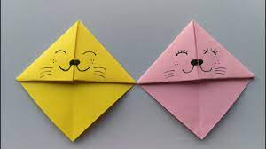 Daha önce katlayarak izlerini belli ettikten sonra tekrar açtığınız sağ ve sol kenarı kat yerlerinden tekrar katlayın. Origami Kitap Ayraci Youtube
