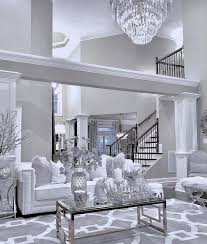 When it comes to interior design, it is almost always preferable to have a bright and airy spaces, than dark and cold rooms. White Monochromatic Living Room Decor Monochromatic Living Room Elegant Living Room Design Luxury Living Room