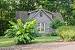 White Painted Log Cabin Exterior
