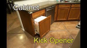 The toe kick allows you to stand next to your base cabinets without stubbing your toes. Cabinet Door Opener Kick To Open Youtube
