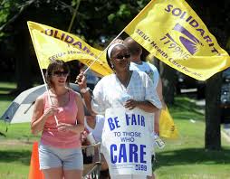 HealthBridge workers working the picket line