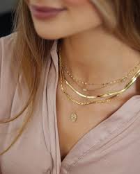 L A Y E R I N G Stacking necklaces gives the freedom to be creative,  express originality by styling a combination that's uniquely yours. Visit  our showroom, mix and match different