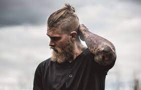 Viking Hairstyles For Men And Women Became Hugely Popular With The Release Of The The History Channel S Vi Man Bun Hairstyles Beard Styles Long Hair Styles Men