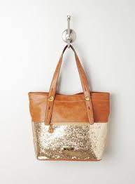 Fortunately it works well for both daytime and evening outings, jazzing up the simplest of outfits or adding extra. Jessica Simpson Jet Setter Glitter Tote Overstock Com Bags Jet Setter Handbag Heaven