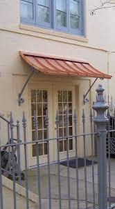Concave Copper Awning With Supports Simple And Clean Copper Awning Metal Awning Canopy Design