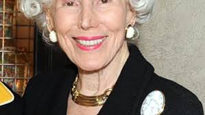 Piano duo, Woman of Distinction award high notes of opera guild benefit.