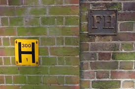 A fire hydrant or fireplug was a device that, when connected with a hose, provided a steady stream of water to enable a fire to be extinguished. Fire Hydrant Signs On A Wall Richmond Hill Surrey Uk Mapio Net