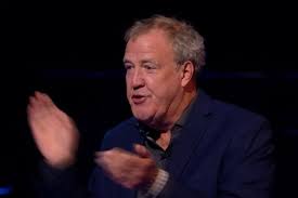 The grand tour presenter jeremy clarkson helps binky felstead change a tyre (youtube.com). Ne5qxxshgmda9m