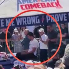 Sketchy New Video Shows 2 Men Seated Behind Charlie Kirk Performing Suspicious Actions Moments Before Shooting [VIDEO] Full story via 🔗 in comments. 👇