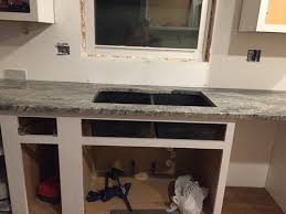 kitchen sink be centered under a window
