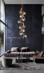 Metal sconce with faceted crystal shade. Modern Hanging Lights Brand Van Egmond