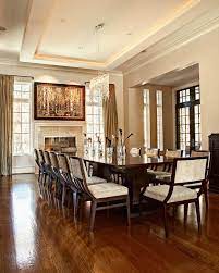 The table's roundness offsets the right angles at each. 23 Designs For Epically Large Dining Rooms Large Dining Room Table Elegant Dining Room Large Dining Table