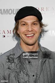 Stilt dancers Kae Burke and Ali Schmitz pose for a photo with Glamour...  News Photo