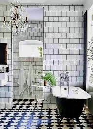 Use ceramic tile to trick the eye into seeing more space. The Mountain Fixer The Final Kids Bath Design Shopping Links Emily Henderson Black Tile Bathrooms Easy Bathroom Decorating Stylish Bathroom