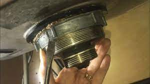 Use a pair of water pump or channellock pliers or a pipe wrench to do this. Kitchen Sink Nut Locknut Removal Tricky Basket Strainer Youtube