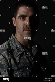U.S. Air Force Capt. Aaron Blackburn, 20th Force Support Squadron manpower  officer, sits for a photo at Shaw Air Force Base, S.C., March 15, 2017.  Blackburn participated in Mustache March, an Air